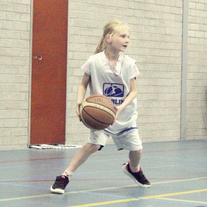 Dribbling basketball school