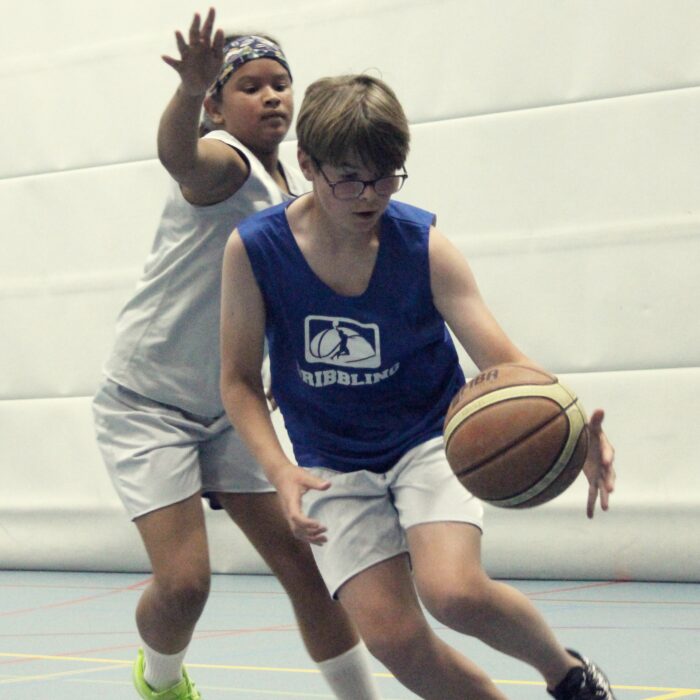 Dribbling basketball school