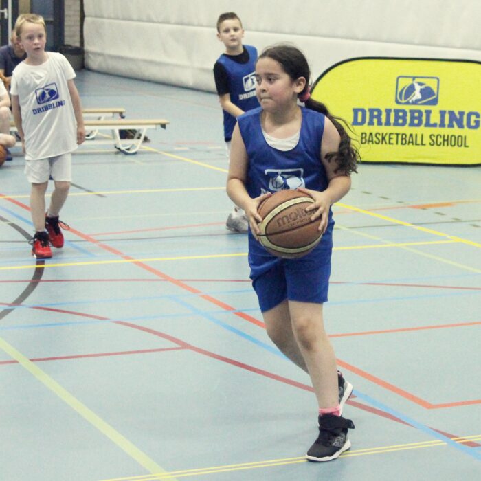 Dribbling basketball school